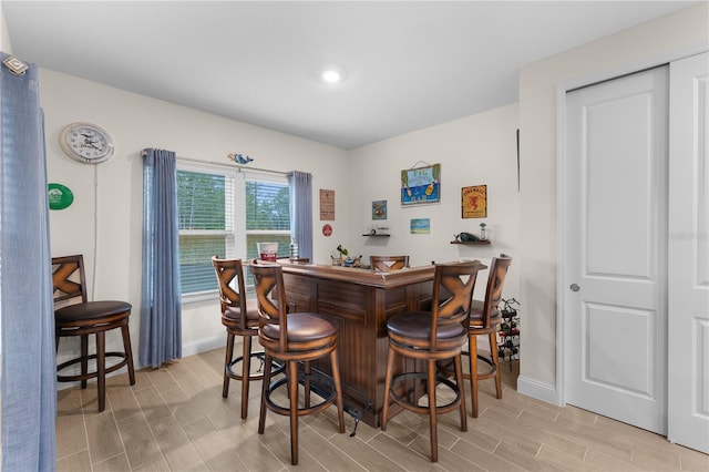 2137 Raglan Cir, Ormond Beach, FL 32174 - indoor dry bar featuring wood finish floors and recessed lighting