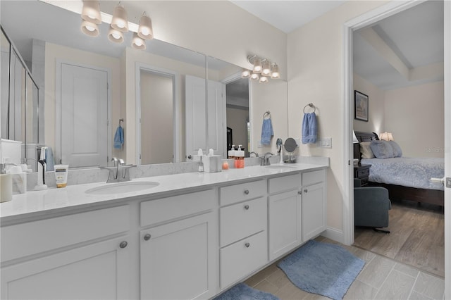 2137 Raglan Cir, Ormond Beach, FL 32174 - bathroom featuring ensuite bath, double vanity, and a chandelier