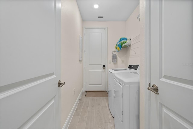2137 Raglan Cir, Ormond Beach, FL 32174 - washroom featuring washing machine and dryer and recessed lighting