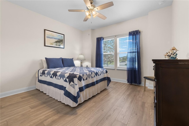 2137 Raglan Cir, Ormond Beach, FL 32174 - bedroom with light wood-type flooring and ceiling fan