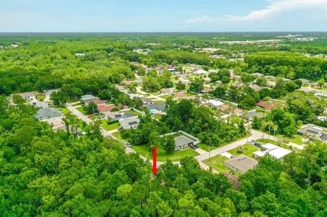 7 Zeolite Pl, Palm Coast, FL 32164 - aerial view of residential area with a heavily wooded area