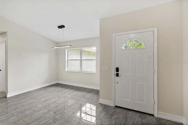 7 Zeolite Pl, Palm Coast, FL 32164 - foyer entrance featuring baseboards