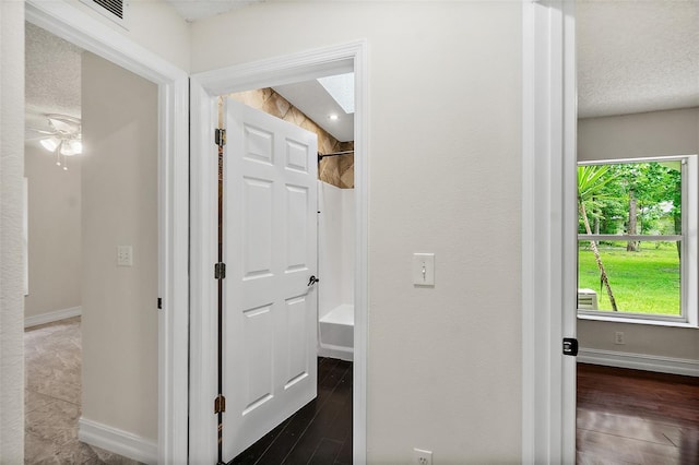 7 Zeolite Pl, Palm Coast, FL 32164 - corridor featuring baseboards and dark wood-type flooring