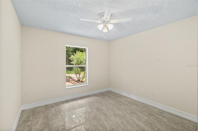 7 Zeolite Pl, Palm Coast, FL 32164 - unfurnished room featuring a textured ceiling and a ceiling fan