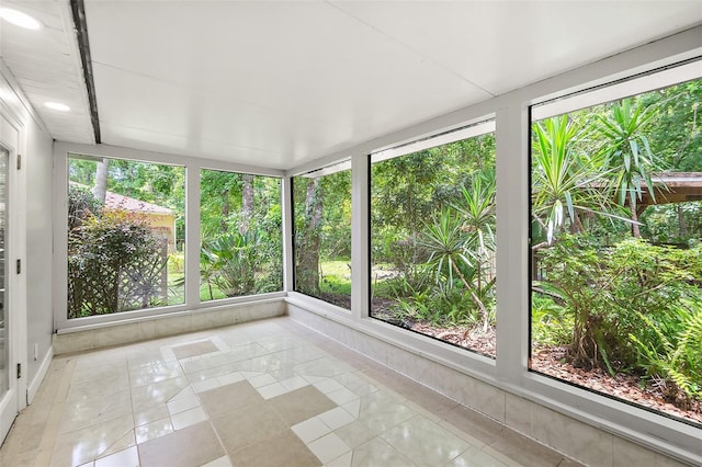 7 Zeolite Pl, Palm Coast, FL 32164 - unfurnished sunroom with tile patterned floors