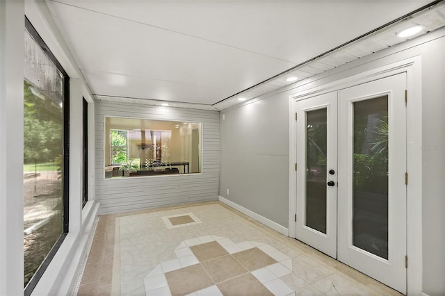7 Zeolite Pl, Palm Coast, FL 32164 - unfurnished sunroom featuring french doors