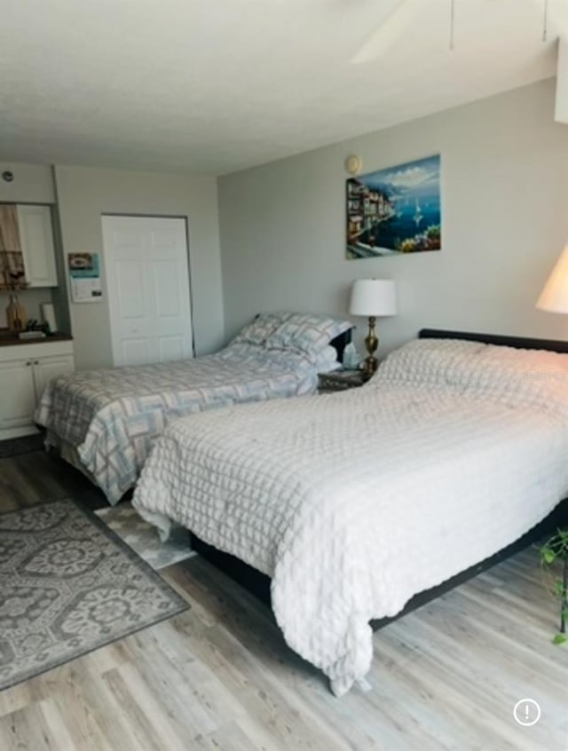 1909 S Atlantic Ave Unit 405/406, Daytona Beach Shores, FL 32118 - bedroom featuring wood finished floors