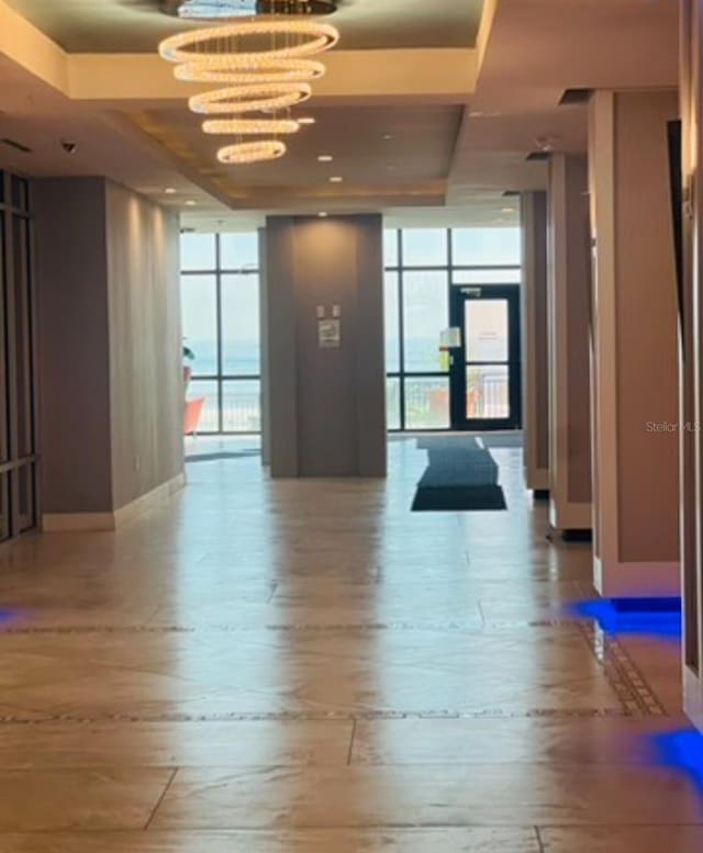 1909 S Atlantic Ave Unit 405/406, Daytona Beach Shores, FL 32118 - common area with floor to ceiling windows