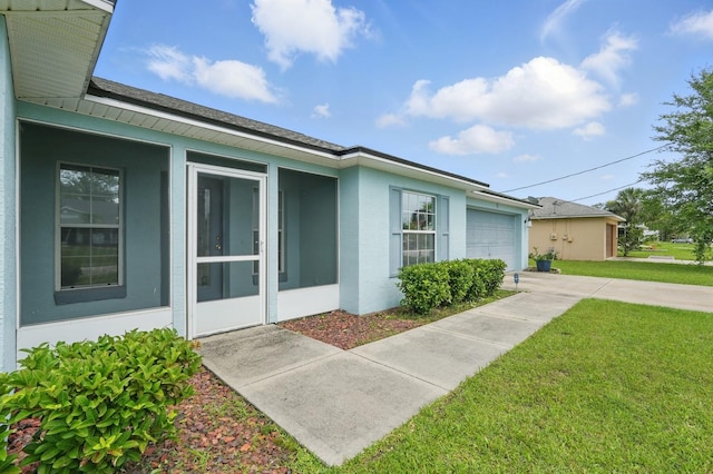 8 Severn Ct, Palm Coast, FL 32164 - view of property exterior featuring a garage, a yard, concrete driveway, and stucco siding