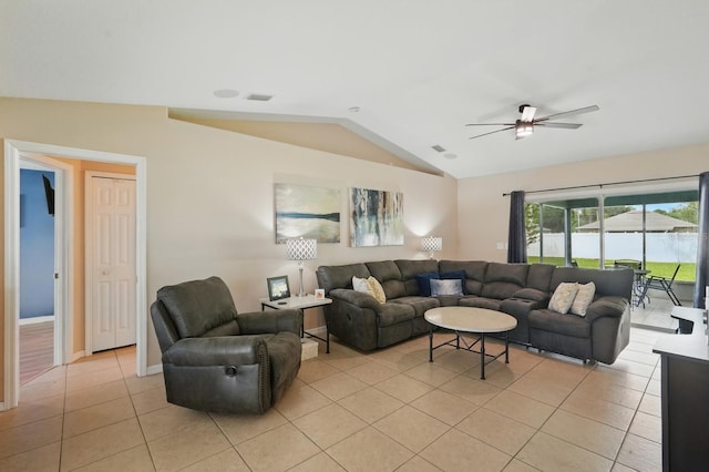 8 Severn Ct, Palm Coast, FL 32164 - living room featuring light tile patterned flooring, a ceiling fan, and vaulted ceiling