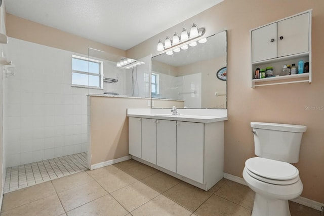 8 Severn Ct, Palm Coast, FL 32164 - bathroom with vanity, walk in shower, and tile patterned flooring