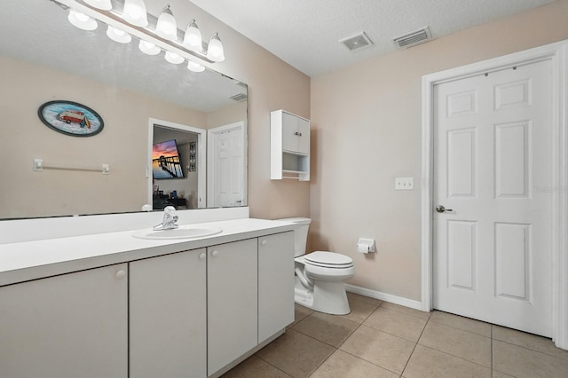8 Severn Ct, Palm Coast, FL 32164 - bathroom featuring vanity and tile patterned flooring