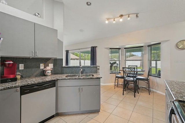 8 Severn Ct, Palm Coast, FL 32164 - kitchen featuring dishwashing machine, gray cabinetry, tasteful backsplash, and light tile patterned flooring