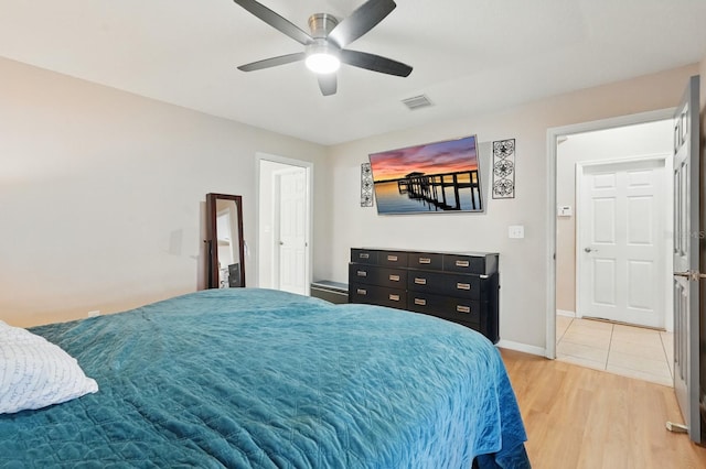 8 Severn Ct, Palm Coast, FL 32164 - bedroom featuring light wood-style flooring and a ceiling fan