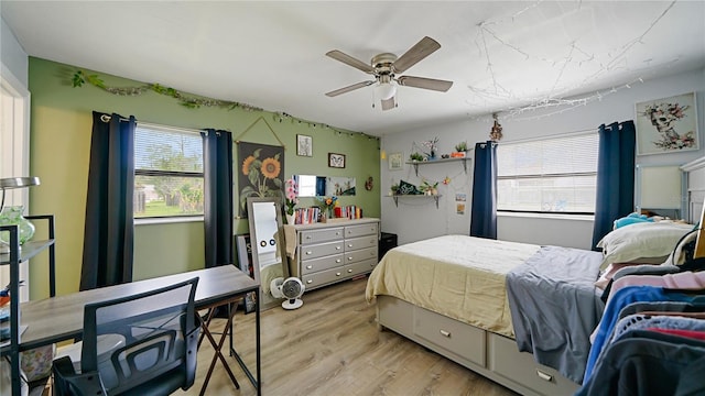 29 Firtree Ln, Palm Coast, FL 32137 - bedroom featuring light wood-type flooring and a ceiling fan