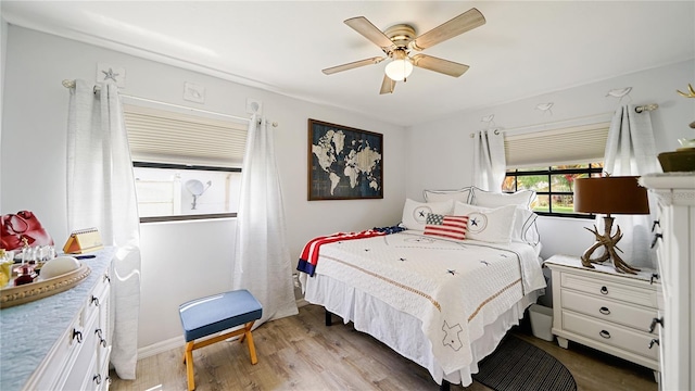 29 Firtree Ln, Palm Coast, FL 32137 - bedroom with light wood-style flooring and a ceiling fan