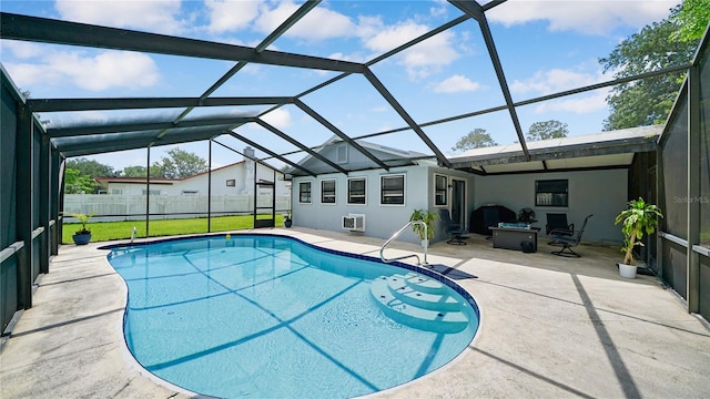 29 Firtree Ln, Palm Coast, FL 32137 - view of swimming pool featuring a patio area and glass enclosure