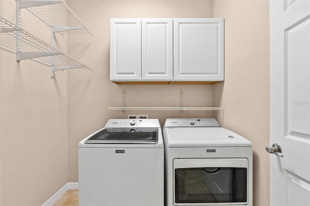 34 Raintree Cir, Palm Coast, FL 32164 - laundry room with separate washer and dryer and cabinet space