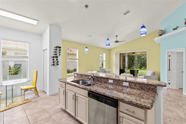 34 Raintree Cir, Palm Coast, FL 32164 - kitchen with dishwasher, open floor plan, ceiling fan, plenty of natural light, and vaulted ceiling