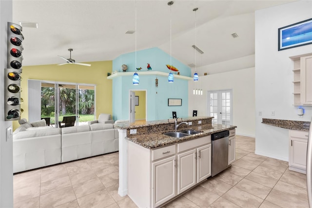 34 Raintree Cir, Palm Coast, FL 32164 - kitchen with dishwasher, open floor plan, ceiling fan, dark stone countertops, and decorative light fixtures