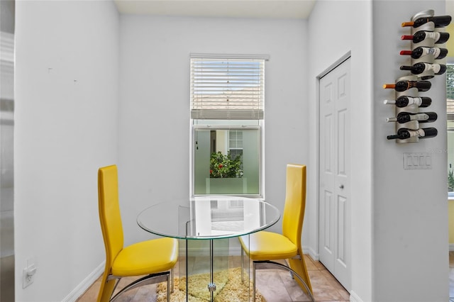 34 Raintree Cir, Palm Coast, FL 32164 - dining space featuring baseboards and tile patterned flooring