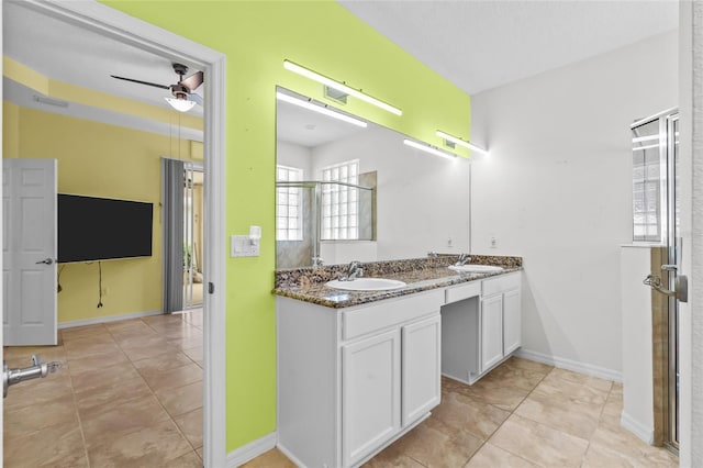 34 Raintree Cir, Palm Coast, FL 32164 - bathroom with double vanity, ceiling fan, and an enclosed shower