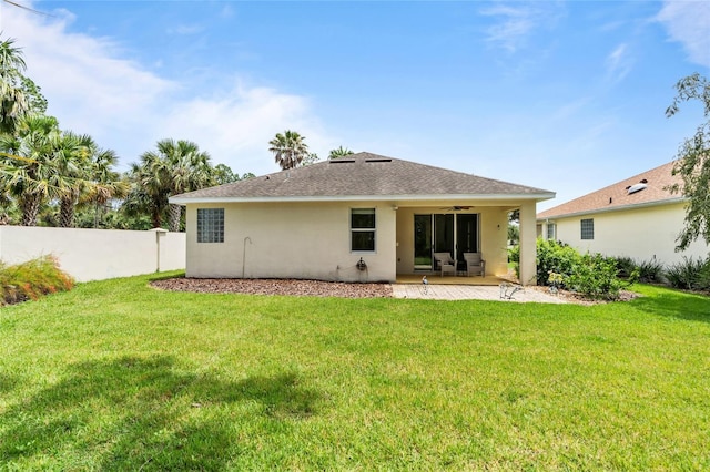 34 Raintree Cir, Palm Coast, FL 32164 - back of property featuring ceiling fan, stucco siding, and a patio