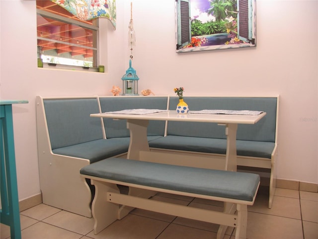 39 Benjamin Dr, Ormond Beach, FL 32176 - tiled dining room with baseboards