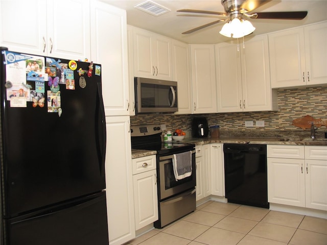 39 Benjamin Dr, Ormond Beach, FL 32176 - kitchen featuring black appliances, light tile patterned floors, ceiling fan, and white cabinetry