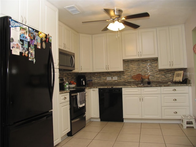 39 Benjamin Dr, Ormond Beach, FL 32176 - kitchen with black appliances, ceiling fan, light tile patterned floors, tasteful backsplash, and white cabinets