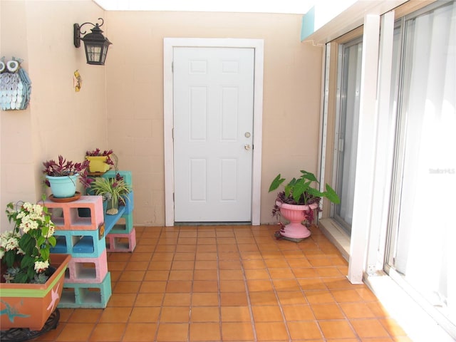 39 Benjamin Dr, Ormond Beach, FL 32176 - doorway to property with stucco siding