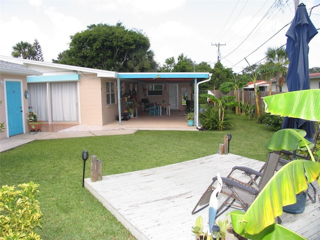 39 Benjamin Dr, Ormond Beach, FL 32176 - view of yard featuring a deck