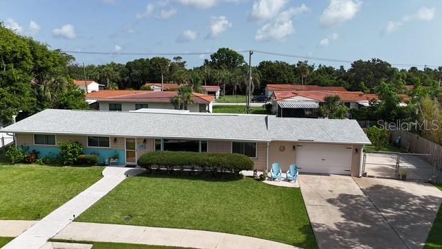 39 Benjamin Dr, Ormond Beach, FL 32176 - single story home featuring driveway and a garage
