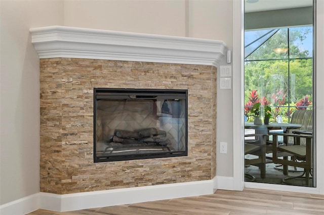 4 Midden Ln, Palm Coast, FL 32137 - detailed view of wood finished floors and a stone fireplace