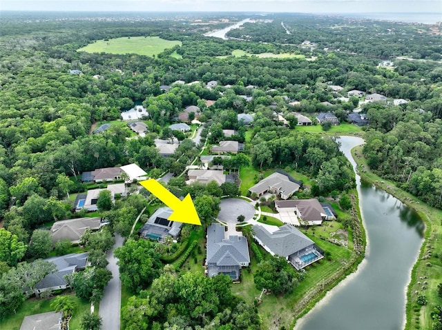 4 Midden Ln, Palm Coast, FL 32137 - aerial view of property and surrounding area featuring a large body of water and nearby suburban area