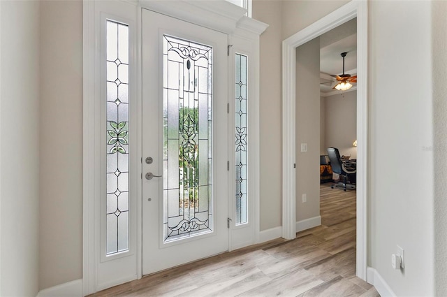 4 Midden Ln, Palm Coast, FL 32137 - entrance foyer with light wood-type flooring and a ceiling fan