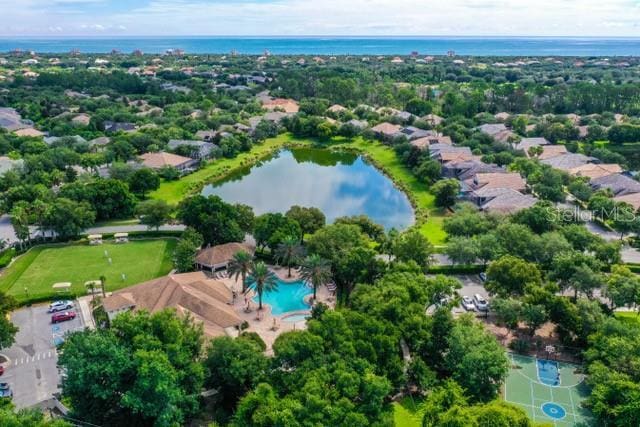 4 Midden Ln, Palm Coast, FL 32137 - drone / aerial view of a pool and a nearby body of water