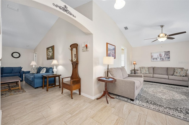 22 Post Tree Ln, Palm Coast, FL 32164 - living room with a ceiling fan, arched walkways, and high vaulted ceiling