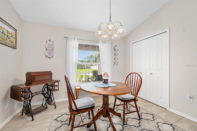 22 Post Tree Ln, Palm Coast, FL 32164 - dining room featuring a chandelier, lofted ceiling, and light tile patterned floors