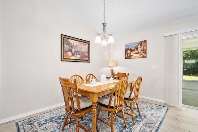 22 Post Tree Ln, Palm Coast, FL 32164 - dining room with a chandelier and baseboards