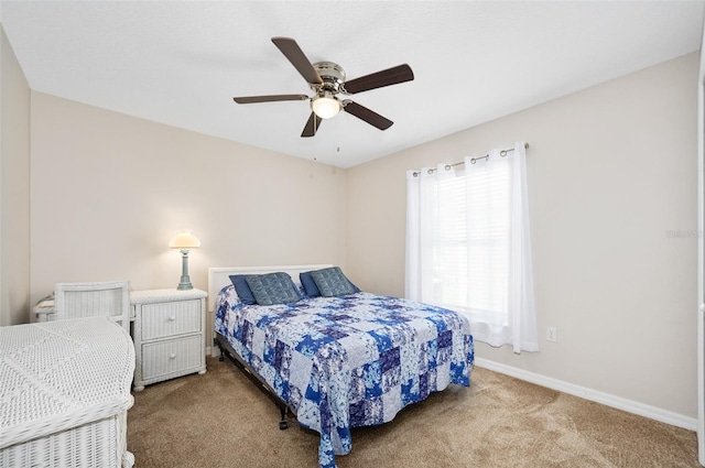 22 Post Tree Ln, Palm Coast, FL 32164 - carpeted bedroom featuring baseboards and ceiling fan