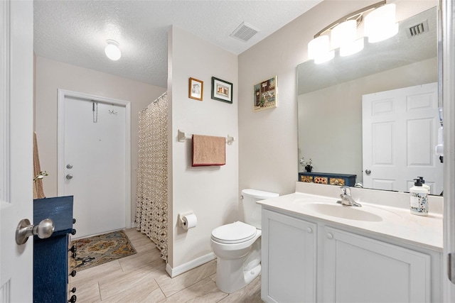 22 Post Tree Ln, Palm Coast, FL 32164 - bathroom with vanity and a textured ceiling