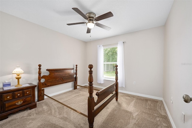 22 Post Tree Ln, Palm Coast, FL 32164 - carpeted bedroom featuring baseboards and a ceiling fan