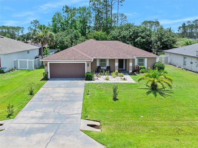 22 Post Tree Ln, Palm Coast, FL 32164 - ranch-style house featuring a garage, driveway, stucco siding, and a shingled roof