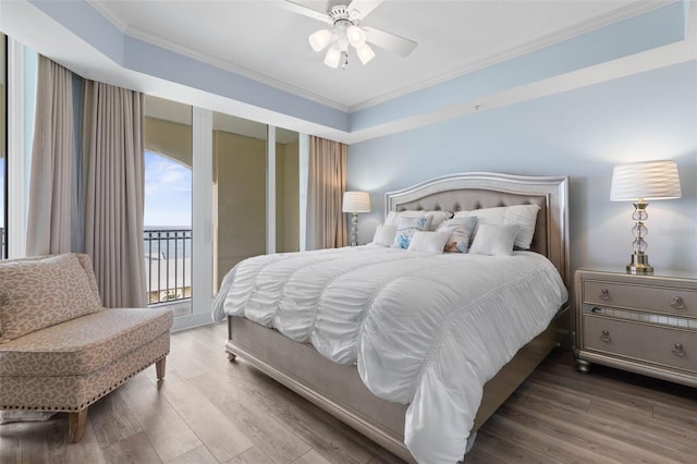 200 Ocean Crest Dr Unit 913, Palm Coast, FL 32137 - bedroom featuring ornamental molding, access to outside, wood finished floors, and a ceiling fan