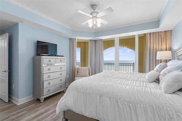 200 Ocean Crest Dr Unit 913, Palm Coast, FL 32137 - bedroom featuring access to exterior, crown molding, wood finished floors, and ceiling fan