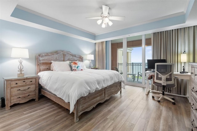 200 Ocean Crest Dr Unit 913, Palm Coast, FL 32137 - bedroom featuring access to outside, crown molding, light wood-style floors, a desk, and ceiling fan