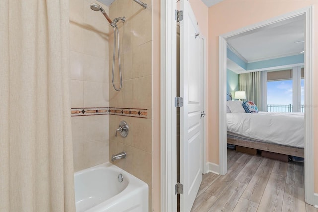 200 Ocean Crest Dr Unit 913, Palm Coast, FL 32137 - full bathroom with ensuite bath, shower / bath combo, and wood finished floors
