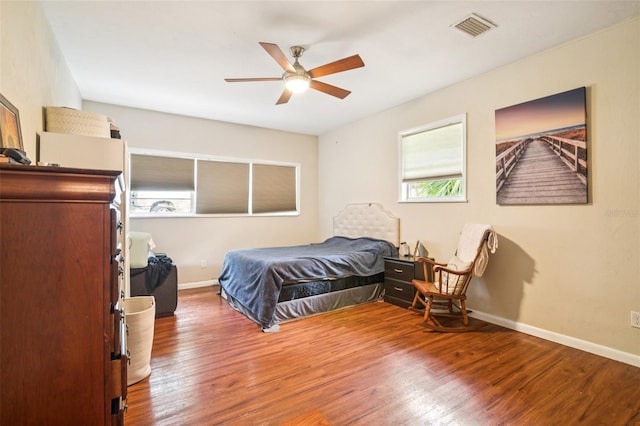 418 NW 27th Ter, Gainesville, FL 32607 - bedroom featuring wood finished floors and a ceiling fan
