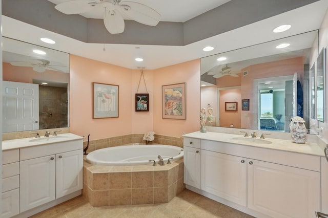 20 Porto Mar Unit 302, Palm Coast, FL 32137 - full bathroom with ceiling fan, a garden tub, two vanities, tile patterned floors, and recessed lighting